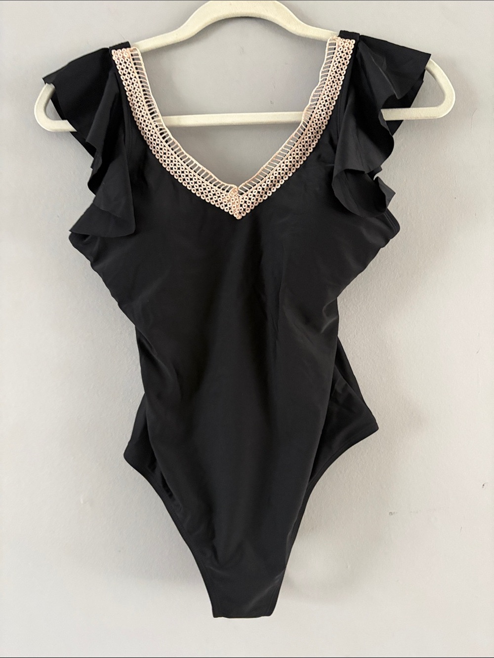 Black One-Piece Swimsuit with Decorative V-Neck